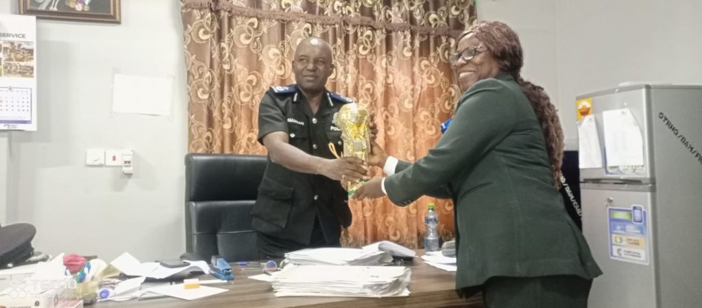 Men's Soccer Trophy Won by DACE Presented to the Oti Regional Commander of Police 2